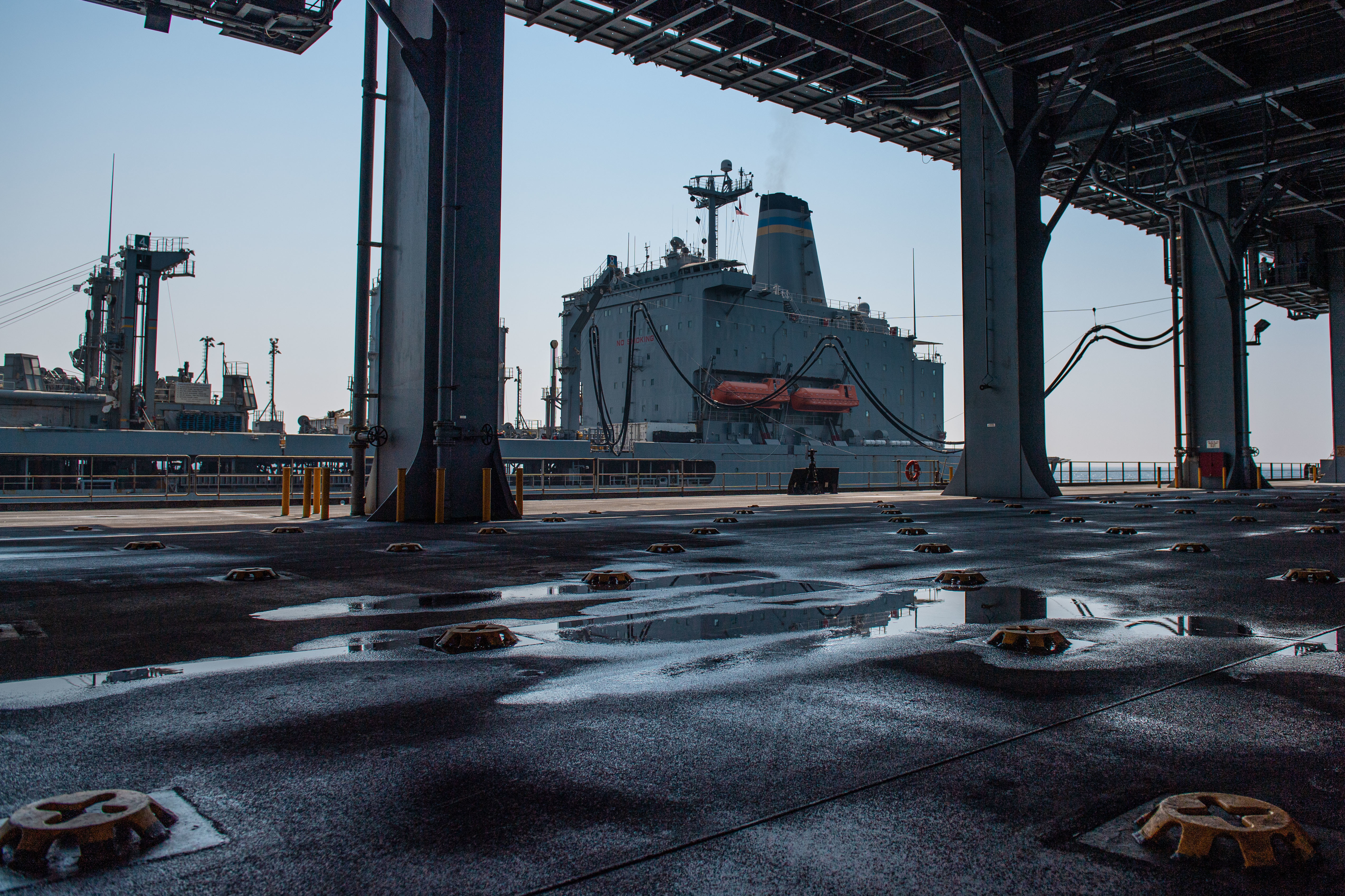 The expeditionary sea base USS Lewis B. Puller (ESB 3) conducts a replenishment-at-sea with the Military Sealift Command fleet replenishment oiler USNS Pecos (T-AO 197) in the Arabian Gulf.