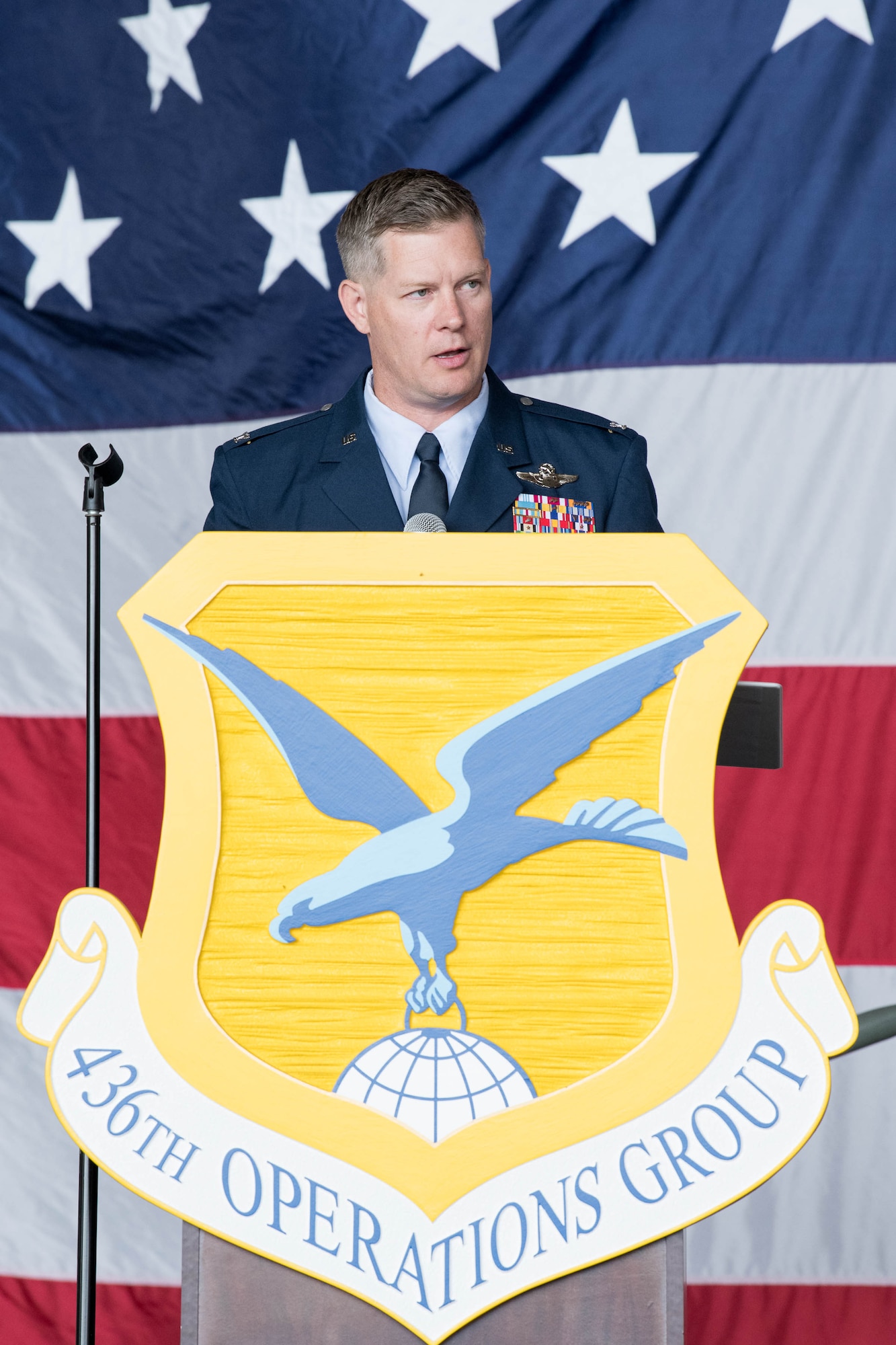 Airmen from the 436th Operations Group give Col. Scott Raleigh his first salute as 436th OG commander during a change of command ceremony at Dover Air Force Base, Delaware, July 15, 2021. The ceremony saw Peeler relinquish command to Col. Scott Raleigh. The 436th OG operates Dover AFB’s fleet of C-5M Super Galaxy and C-17 Globemaster III aircraft supporting rapid global mobility. (U.S. Air Force photo by Mauricio Campino)