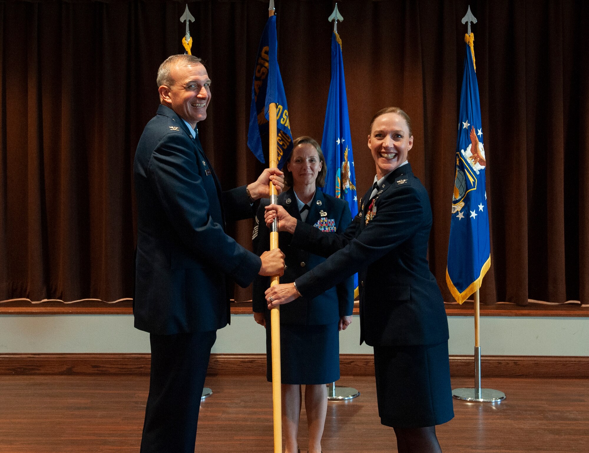U.S. Air Force Col. Mary-Kathryn Haddad relinquishes command of the Geospatial and Signatures Intelligence Group, National Air and Space Intelligence Center, Wright-Patterson Air Force Base, Ohio, July 15, 2021. The Geospatial and Signatures Intelligence Group’s mission is to create geospatial and signatures intelligence and innovate advanced capabilities to characterize objects, activities, and events to deliver decision advantage for the Air Force and the Nation.