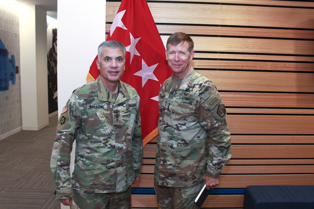 Photo By Sgt. 1st Class Teddy Wade | Gen. Paul Nakasone, commander of U.S. Cyber Command, Director of the National Security Agency and Chief of the Central Security Service (left), meets with Lt. Gen. Stephen G. Fogarty, commander of U.S. Army Cyber Command, (ARCYBER) during a visit and series of briefings with ARCYBER leaders at the command's headquarters at Fort Gordon, Ga., July 14, 2021. (Photo by Master Sgt. Teddy Wade)