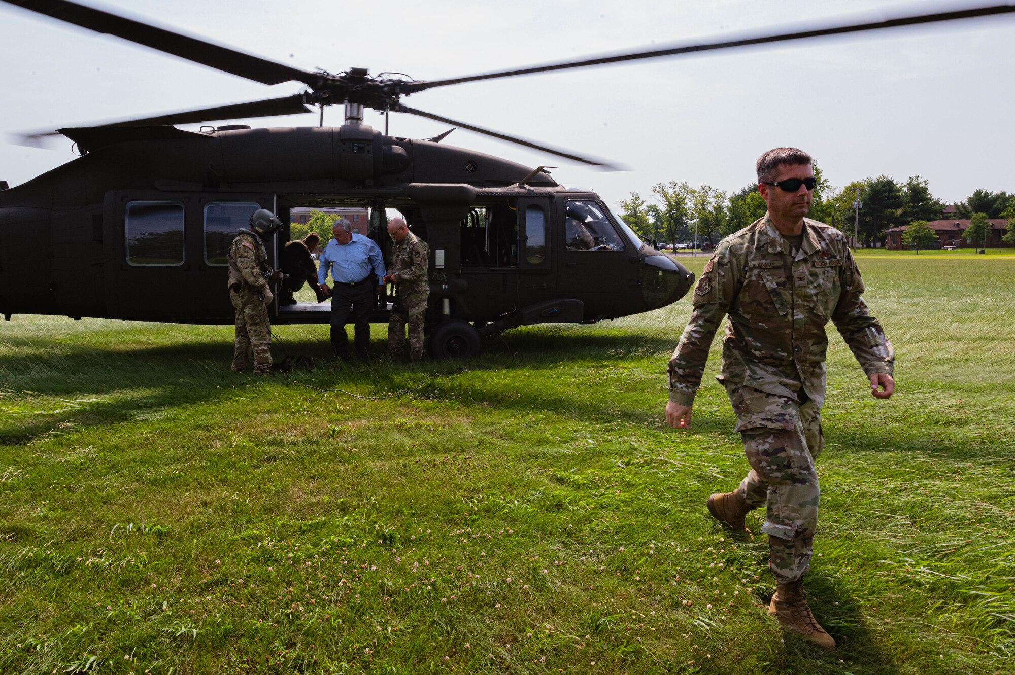 U.S. Air Force Col. Wes Adams, Joint Base McGuire-Dix-Lakehurst commander and 87th Air Base Wing commander, departs a UH-60 Blackhawk on Joint Base MDL
