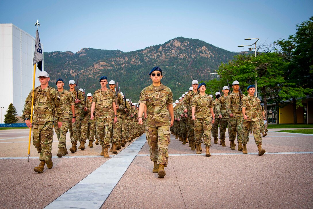 Air Force cadets march in formation.