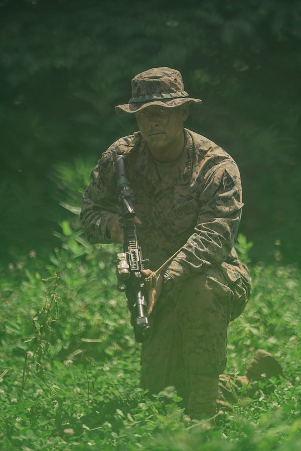 U.S. Marine Corps Cpl. Collin Dye, a rifleman with India Company, Third Battalion, 23rd Marine Regiment, poses for a photo while training for a squad competition at Fort Knox, Kentucky, on June 26, 2021. The goal of this training is to enable a rifle squad to complete any mission by perfecting skills like land navigation, patrolling, offensive and defensive postures, and mastery of weapons and tactics. (U.S. Marine Corps photo by Cpl. James Stanfield)