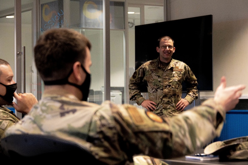 U.S. Air Force Tech. Sgt. Devin Bable, 305th Aircraft Maintenance Squadron integrated communications navigation system craftsman, pitches his avionics training simulation to Airmen at the Infinity Spark Innovation Lab