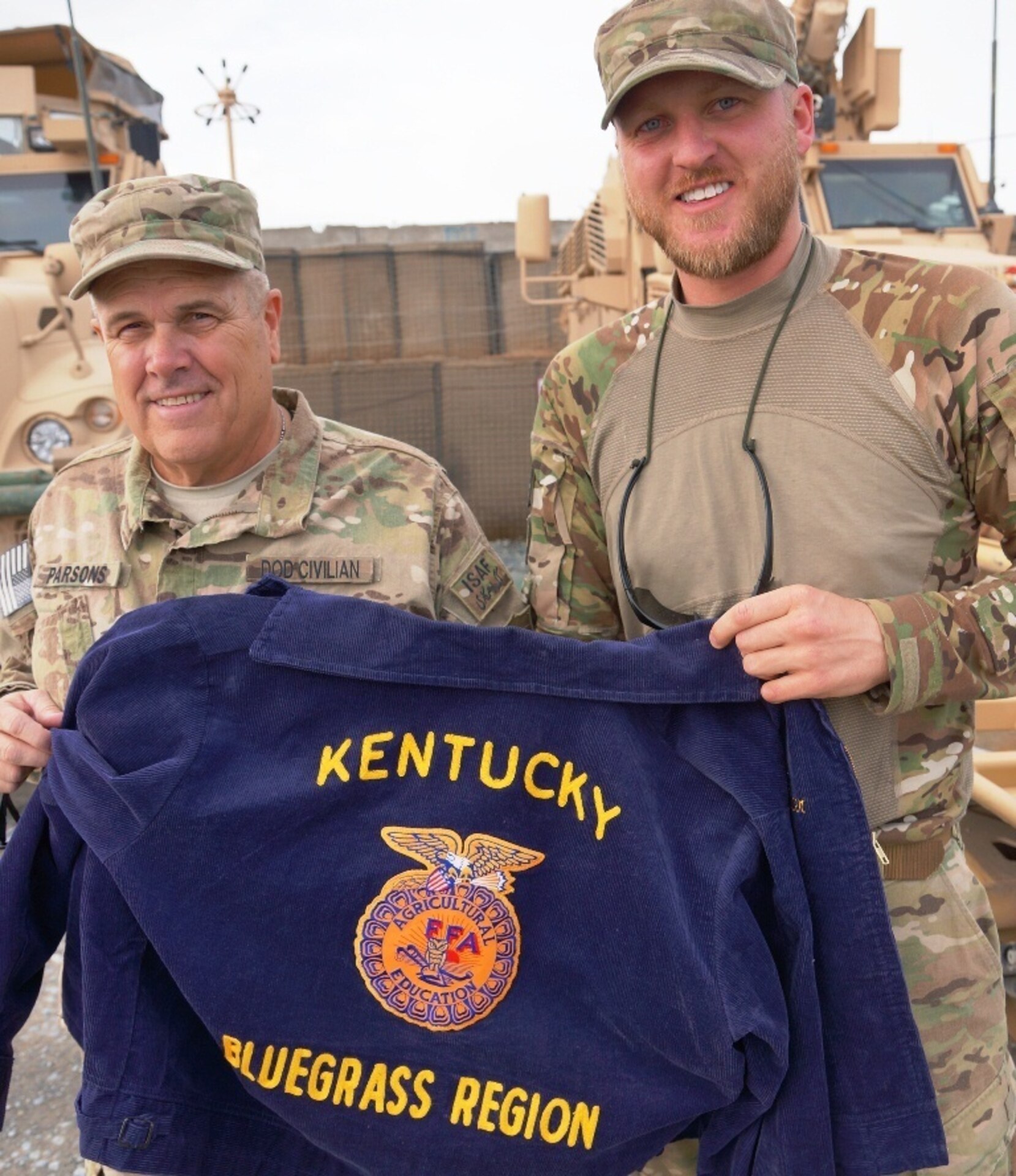 The two civilian agricultural specialists from Kentucky's Agribusiness Development Team 4 assisted putting together the training with local agricultural leaders to help educate farmers in the area.