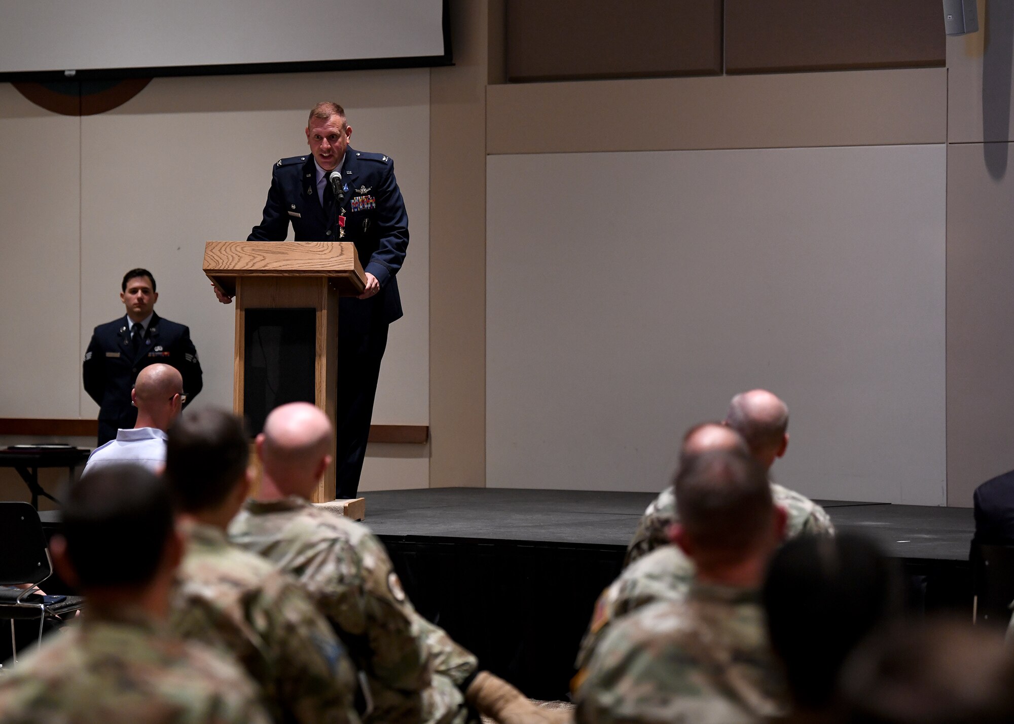 Col. Richard Bourquin, outgoing Space Delta 4 commander, addresses the audience at the DEL 4 change of command ceremony on Buckley Space Force Base, Colo., July 15, 2021. Bourquin reminisced on his time as the DEL 4 commander and expressed his gratitude for the chance to lead the missile warning delta. (U.S. Space Force photo by Airman 1st Class Haley N. Blevins)