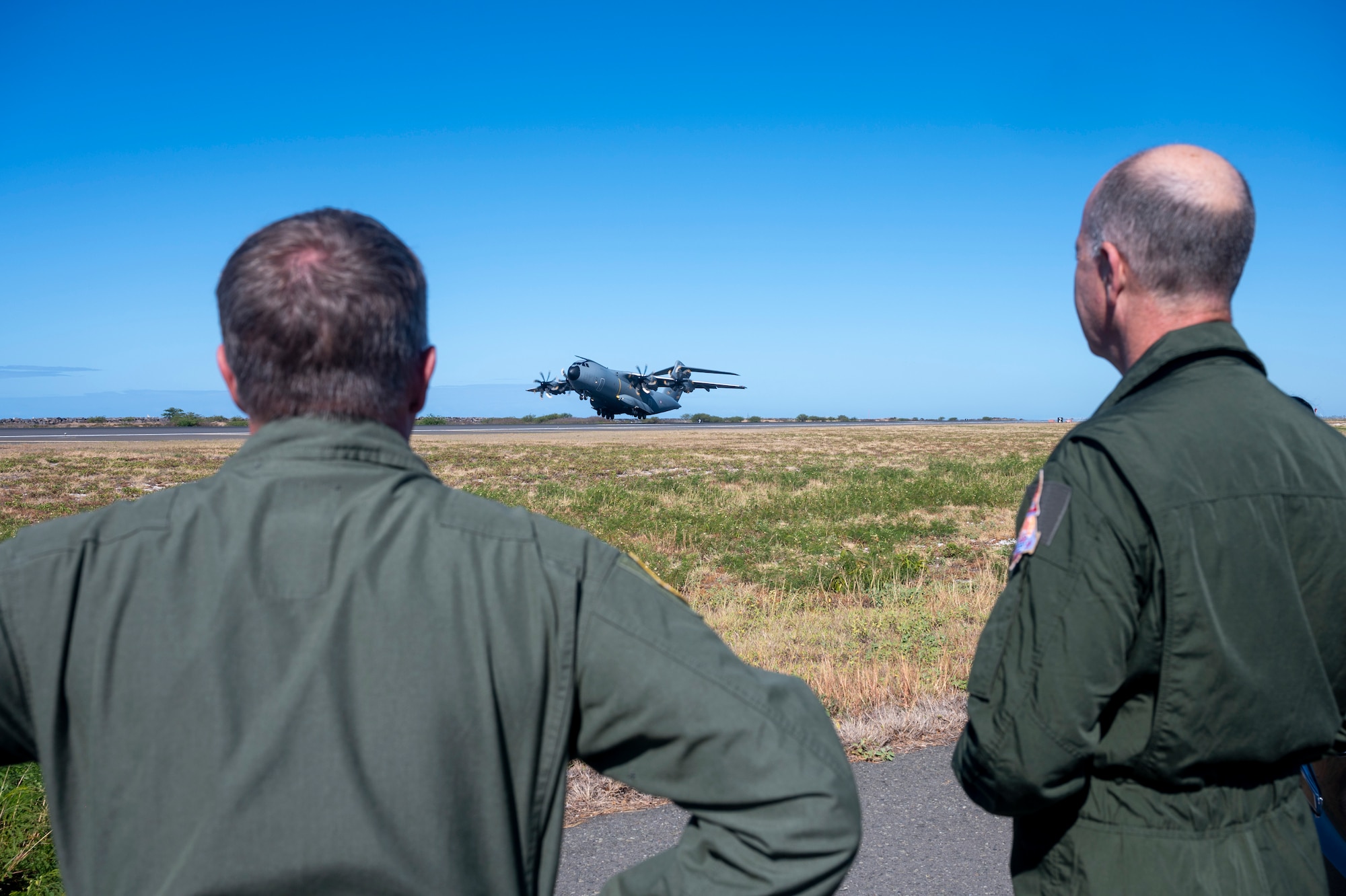 Brig. Gen. Dann S. Carlson, 154th Wing commander, Hawaii Air National Guard and Lt. Gen. Vincent Cousin, commander, Air Defence and Operations Command - French Air and Space Force, observe an A400M Atlas take-off at Honolulu International Airport, Hawaii, June 29, 2021.