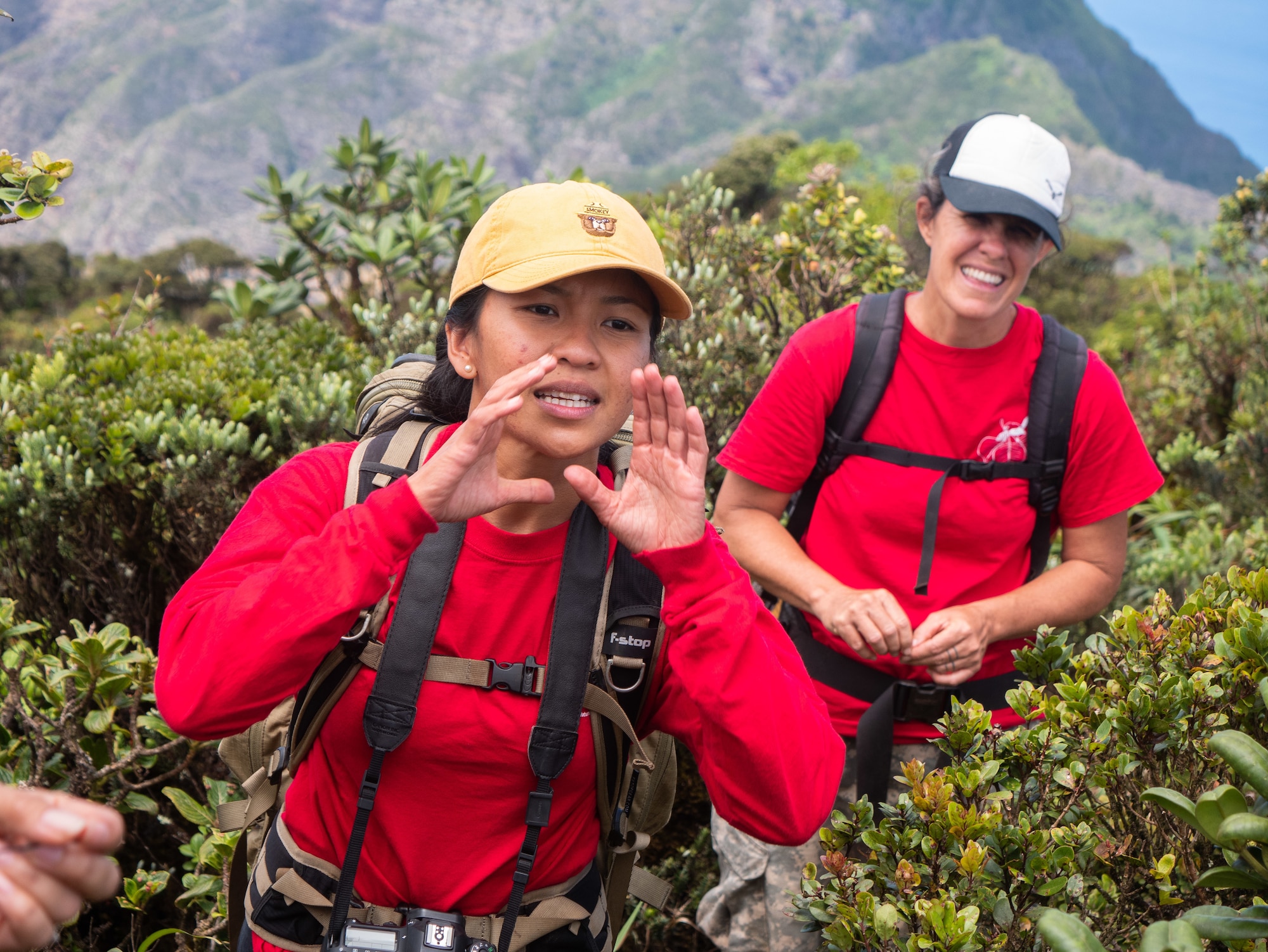 Airman 1st Class Genesaret Balladares,154th Security Forces Squadron member, leads a team of volunteers during a conservation project event June 8, 2021, on Mount Kaala, Hawaii.