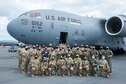 Total-force Airmen who comprise ‘Team Hickam’ and Reserve Officers' Training Corps cadets gather in front of a C-17 Globemaster III May 25, 2021, at Joint Base Pearl Harbor-Hickam, Hawaii.