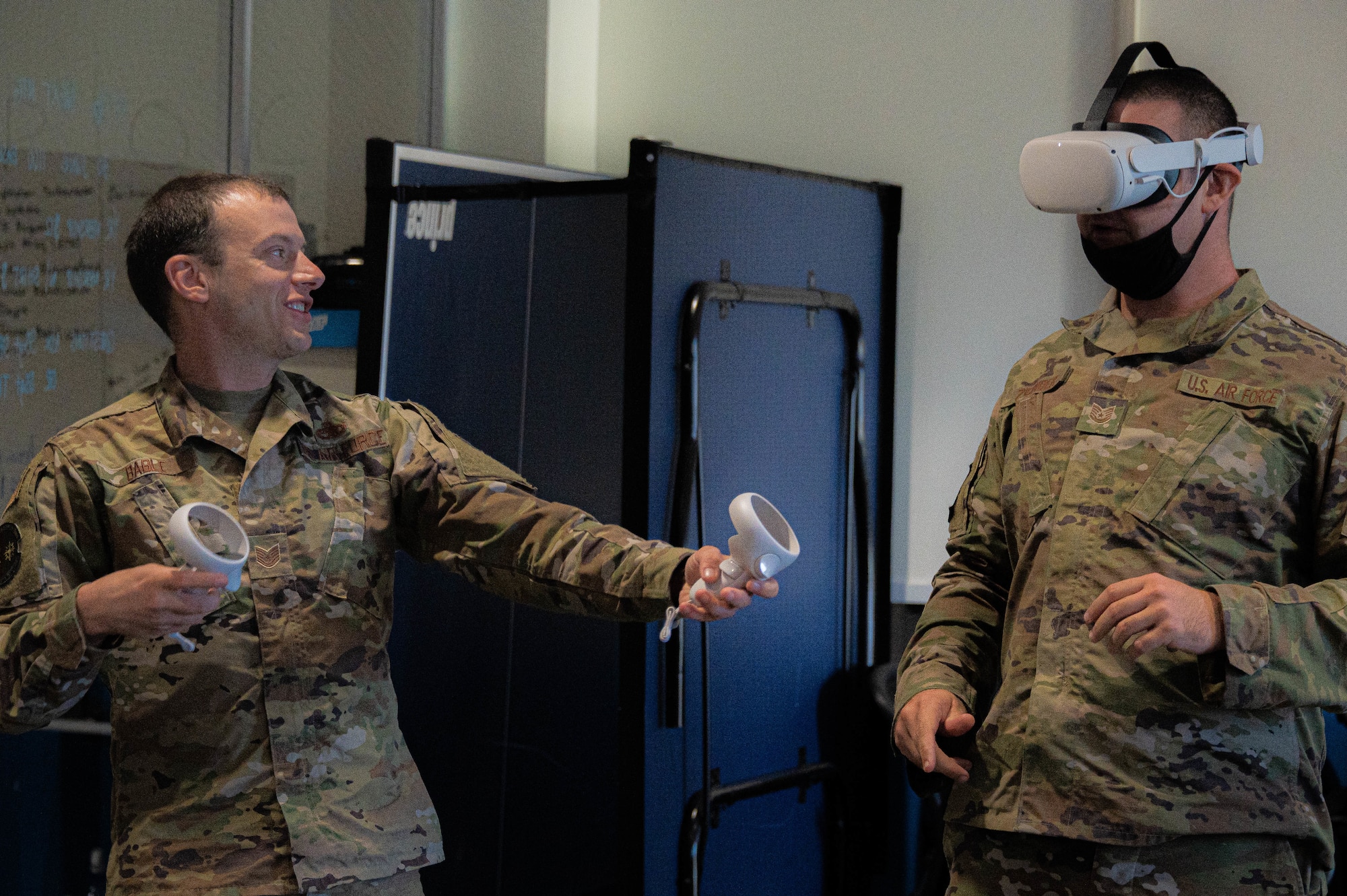 U.S. Air Force Tech. Sgt. Devin Bable, 305th Aircraft Maintenance Squadron integrated communications navigation system craftsman, displays a virtual reality training simulation to Airmen at the Infinity Spark Innovation Lab