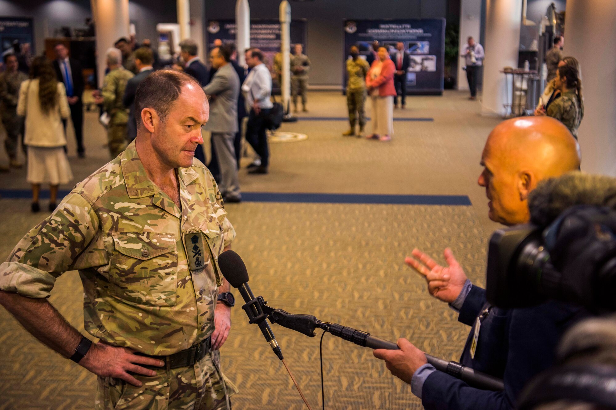 Gen. Sir Patrick Sanders, U.K. Strategic Command commander, conducts an interview with a member from media during a Space and Missile Systems Center overview presentation at the Gordon Conference Center on Los Angeles Air Force Base, California, July 15, 2021. Multiple media representatives from different U.K. news agencies attended the event. (U.S. Space Force photo by Staff Sgt. Luke Kitterman)