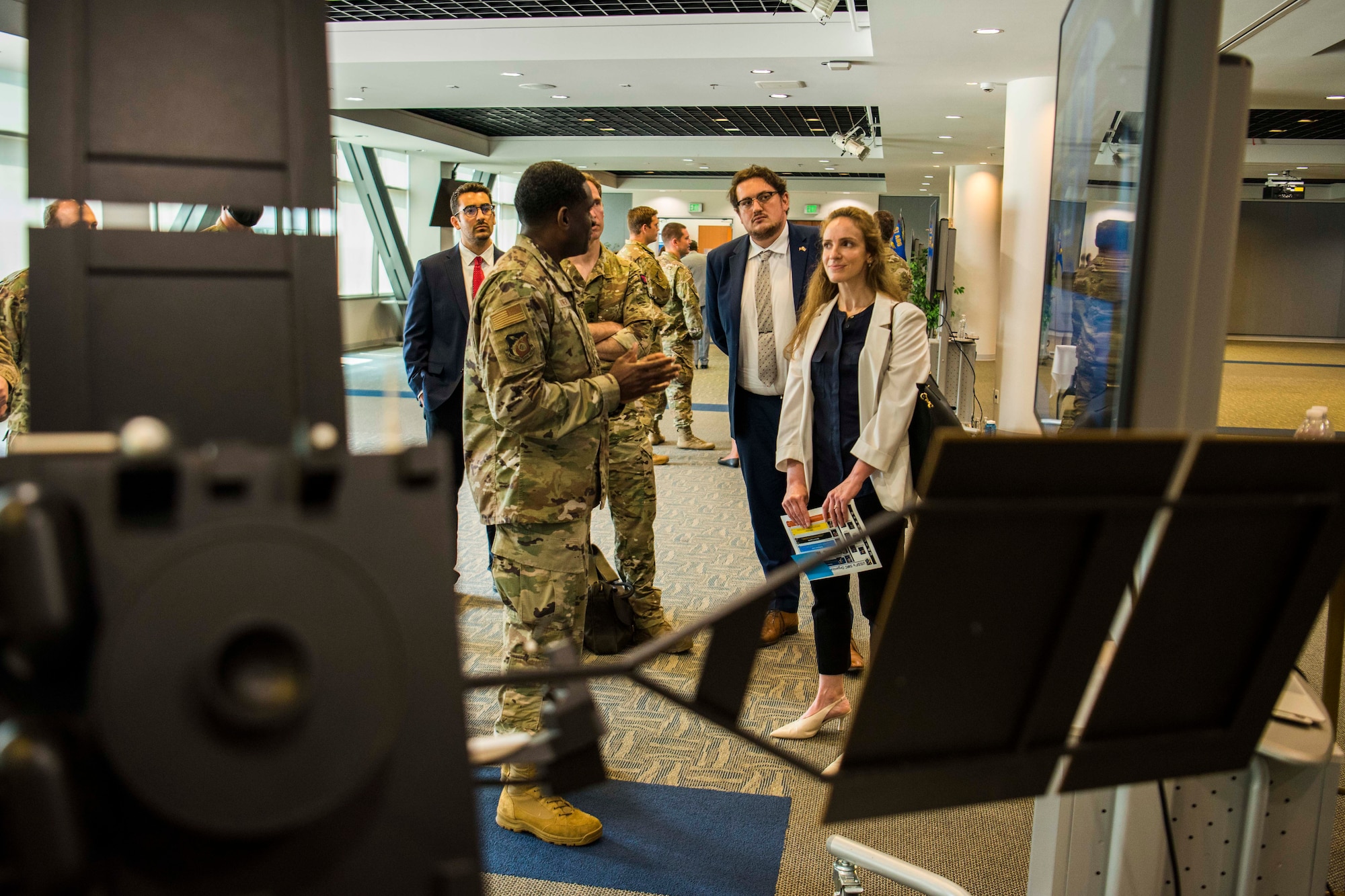 Dame Karen Pierce, Her Majesty’s Ambassador to the U.S., right, listens to a brief from a subject matter expert from the Chief Partnership Office, during a Space and Missile Systems Center overview presentation at the Gordon Conference Center on Los Angeles Air Force Base, California, July 15, 2021. Experts from each of SMC’s Corps briefed the U.K. delegation on topics such as SpaceWERX, International Space Pitch Day and Small Satellite Launch capabilities. (U.S. Space Force photo by Staff Sgt. Luke Kitterman)