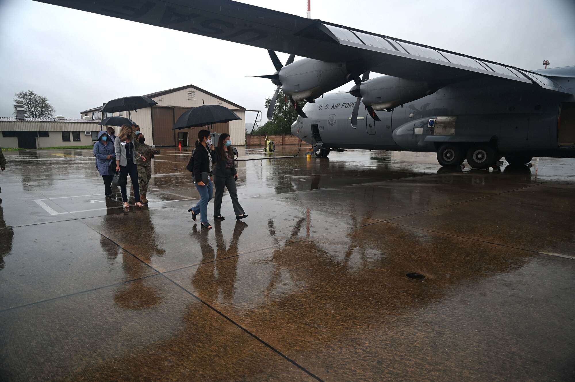 Mrs. Sharene Brown walks toward a U.S. Air Force C-130J Super Hercules aircraft during an 86th Aeromedical Evacuation Squadron tour at Ramstein Air Base
