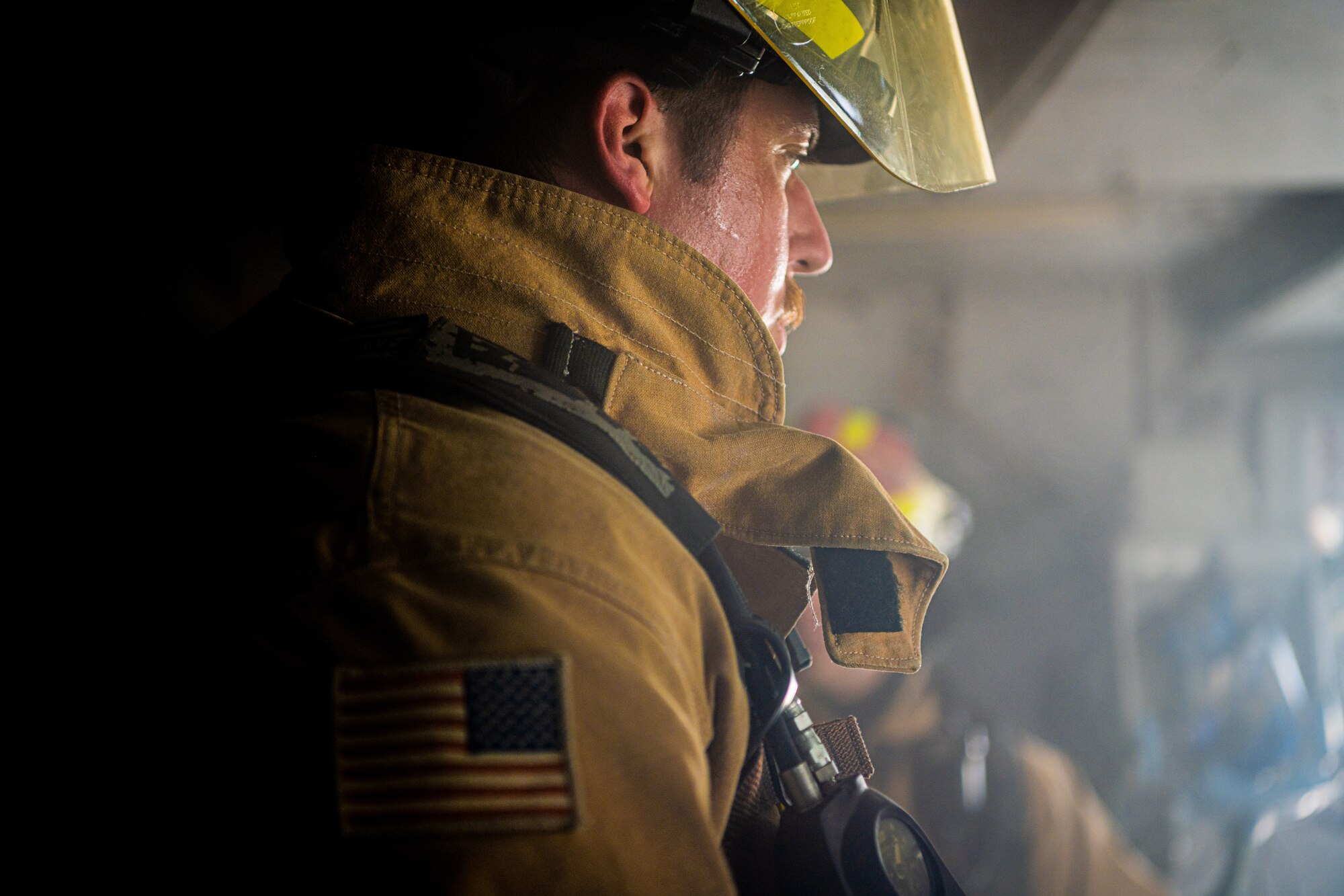 U.S. Air Force Airmen of the 380th Expeditionary Fire Department perform an exercise involving a KC-10 Extender aircraft at Al Dhafra Air Base, United Arab Emirates.