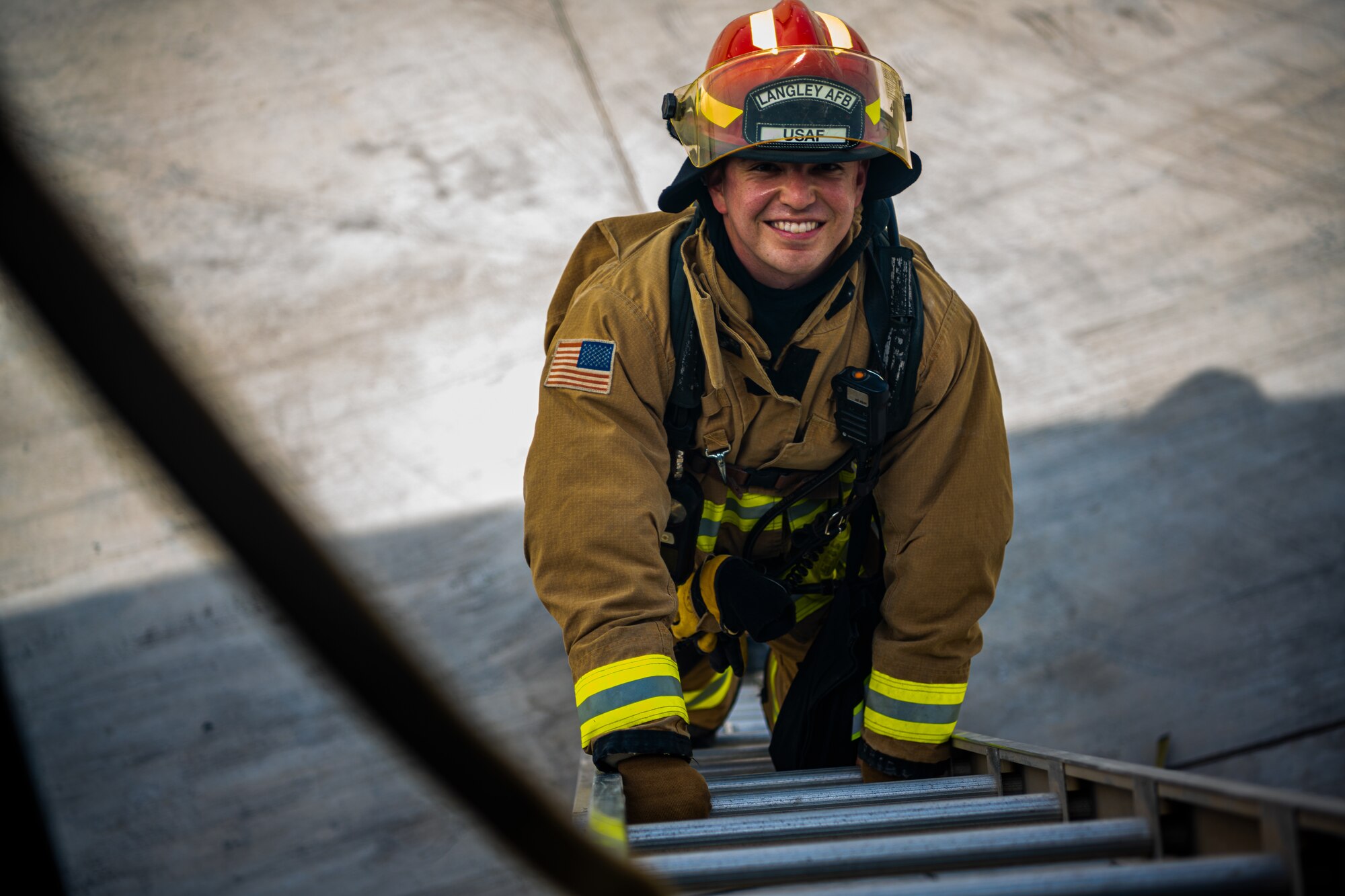 U.S. Air Force Airmen of the 380th Expeditionary Fire Department perform an exercise involving a KC-10 Extender aircraft at Al Dhafra Air Base, United Arab Emirates.