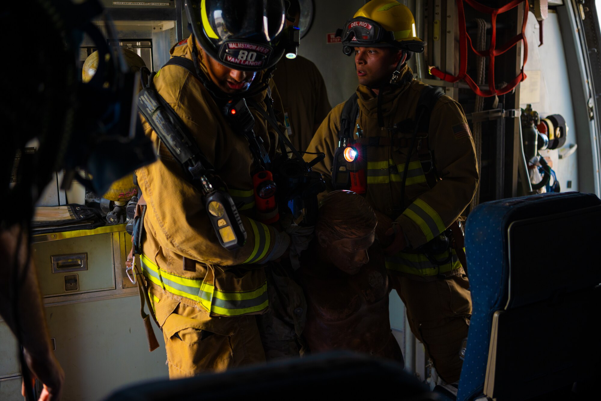 U.S. Air Force Airmen of the 380th Expeditionary Fire Department perform an exercise involving a KC-10 Extender aircraft at Al Dhafra Air Base, United Arab Emirates.