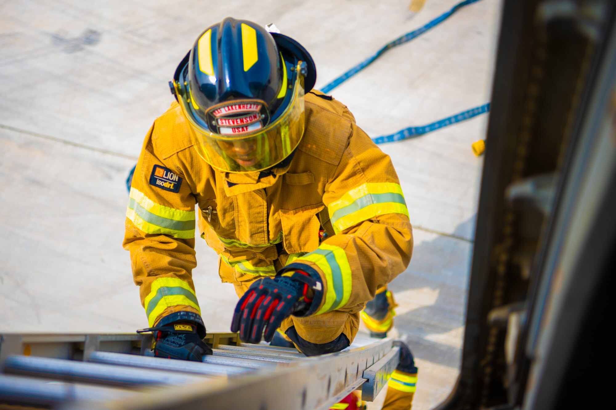 U.S. Air Force Airmen of the 380th Expeditionary Fire Department perform an exercise involving a KC-10 Extender aircraft at Al Dhafra Air Base, United Arab Emirates.