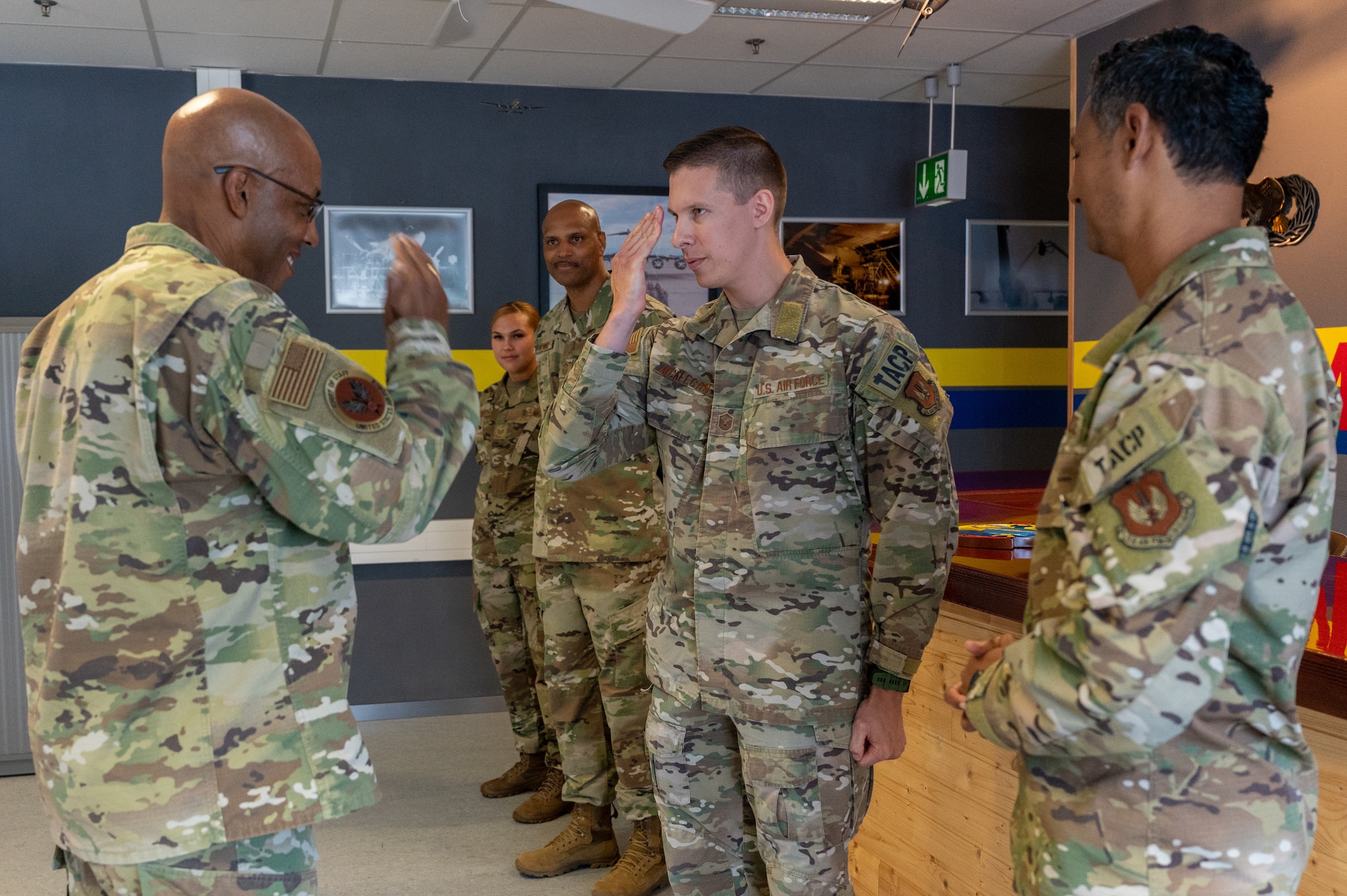 Airman saluting the CSAF.