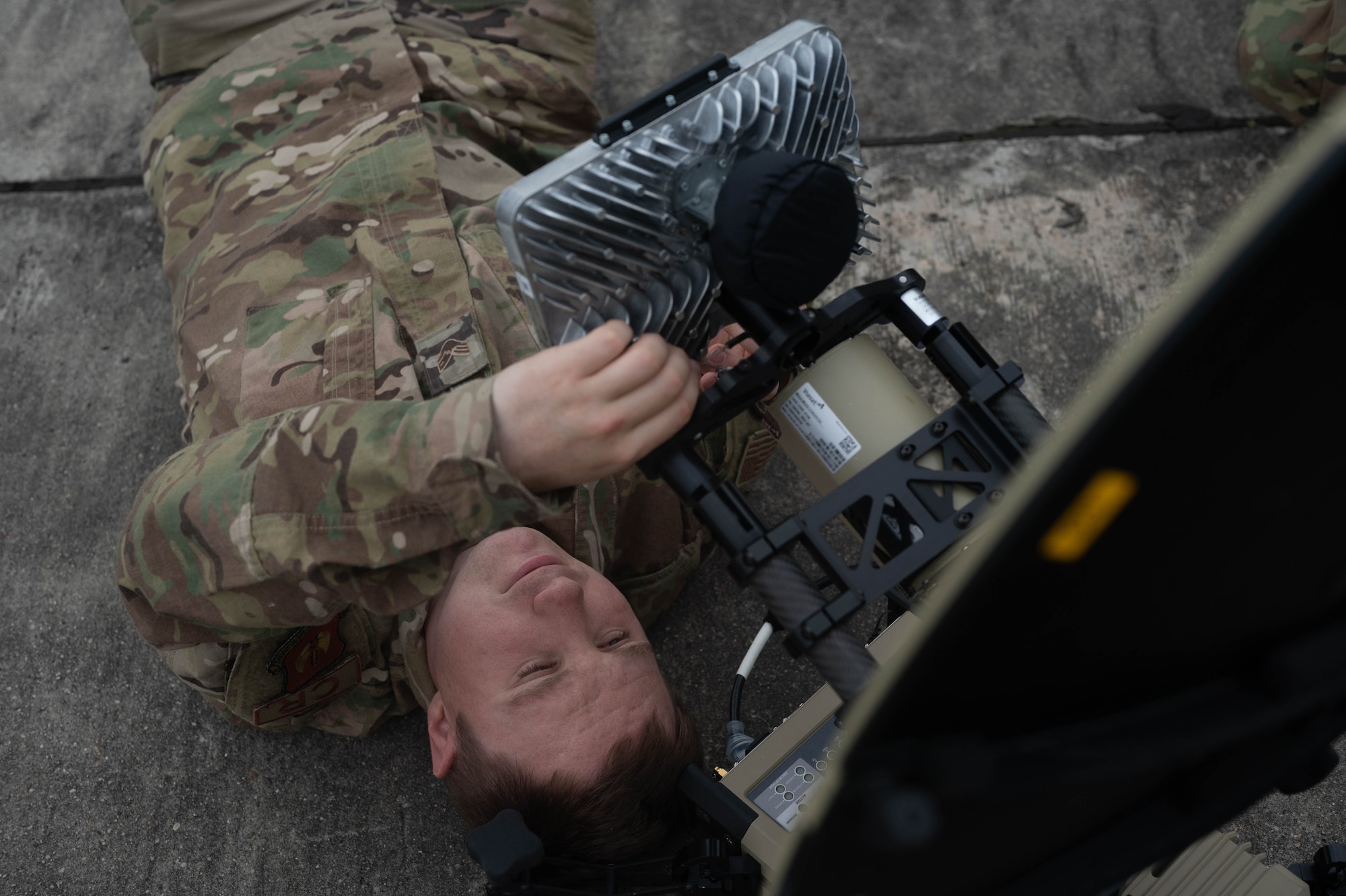 An Airman works on communications systems.