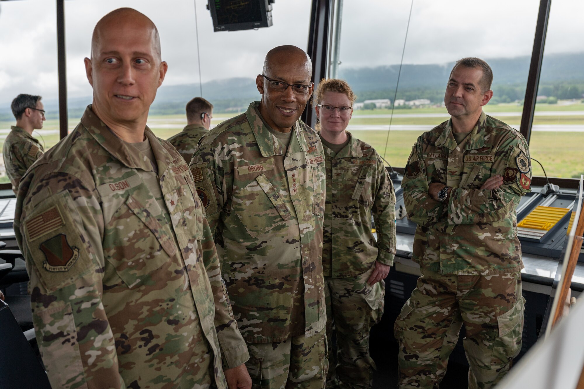 CSAF standing with three wing commanders.