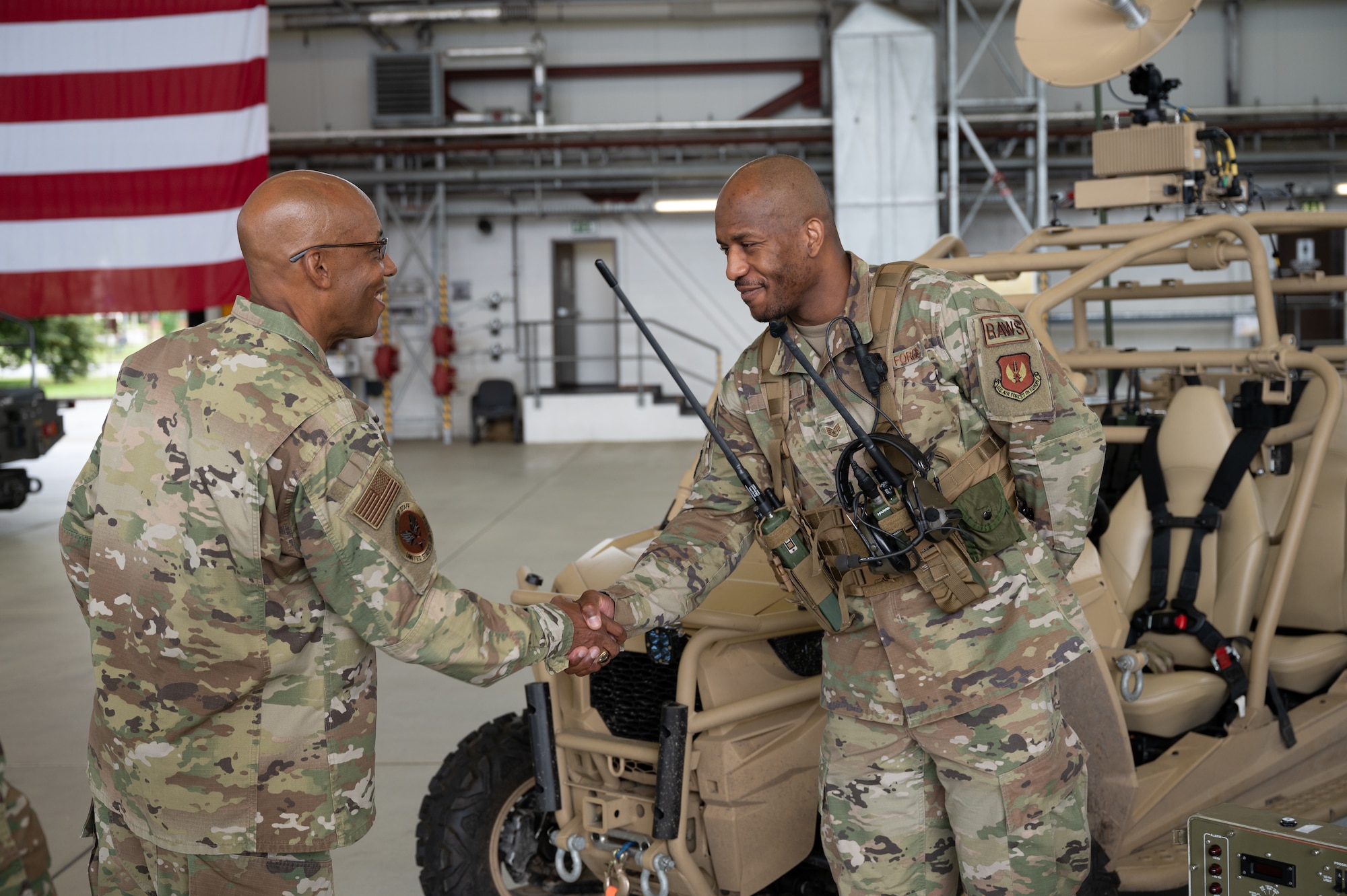 General Brown coins a Ramstein Airman