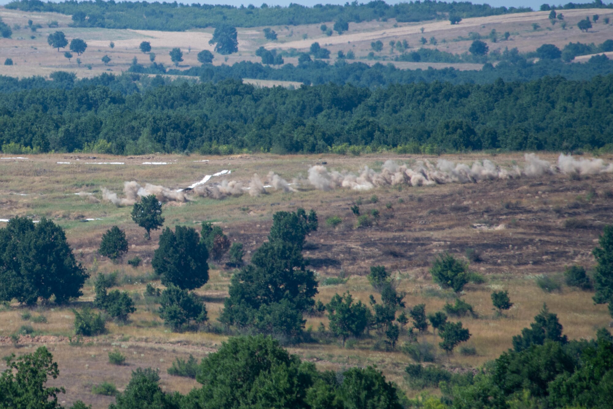 An F-16 Fighting Falcon assigned to the 555th Fighter Squadron fires ammunition at a range during Bulgarian air force-led Thracian Star 21 at a Graf Ignatievo Air Base range, July 14, 2021. Training missions during Thracian Star 21 include offensive counter air and defensive counter air, protection of high value assets, and close air support in a contested environment. (U.S. Air Force photo by Airman 1st Class Brooke Moeder)