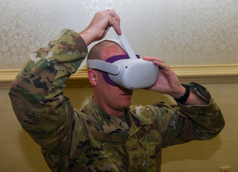 Master Sgt. Jonah Uhl,  628th Force Support Squadron first sergeant, puts on an virtual reality headset to play test a sexual assault prevention and response training module that has been created by Air Mobility Command and a contracted company called Moth + Flame July 15th, 2021, at Joint Base Charleston S.C. This form of SAPR training is an is part of an effort to engage to engage the Airmen in a more effective manner.