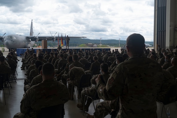 An Airman asks a question during an all call