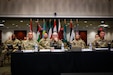 U.S. Army Central Command Sgt. Maj. Brian Hester and staff Sgts. Maj. listen as someone speaks during the USARCENT Land Forces NCO Symposium, July 14, 2021 in the Lucky Conference Room at USARCENT headquarters on Shaw Air Force Base, S.C. This annual symposium was held to solidify relationships and increase the capacity of professionalism of our partner nations NCO Corps. (U.S. Army photo by Spc. Keon Horton)