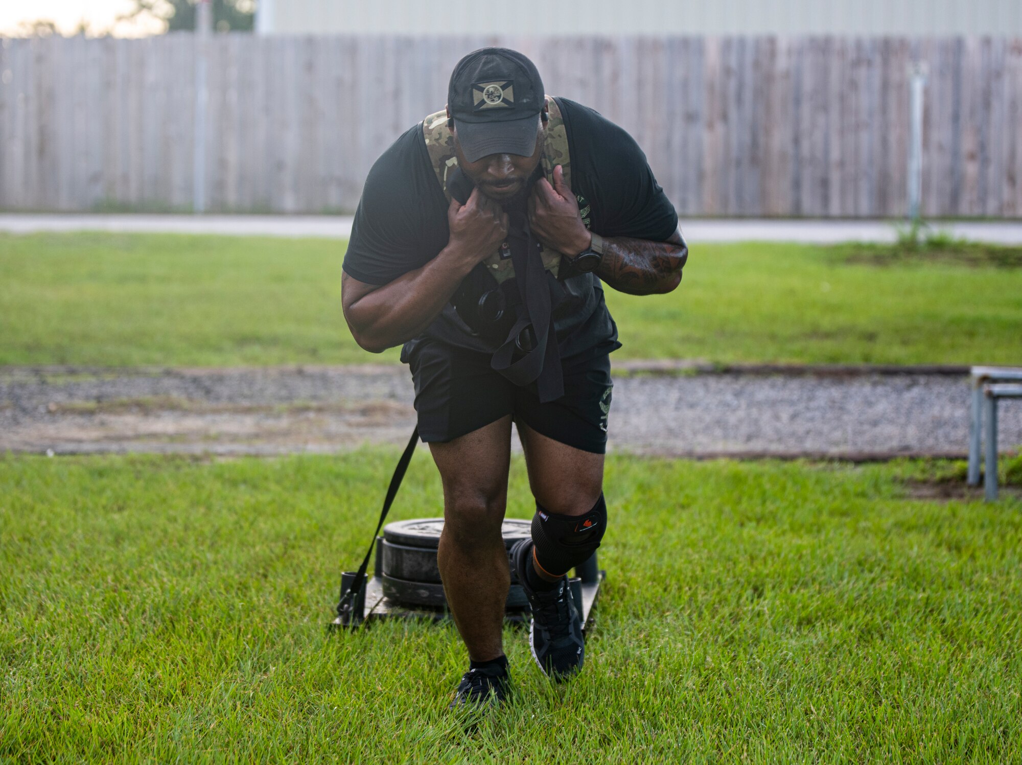 A Bay County Sheriff’s Office special weapons and tactics officer pulls a weighted sled during a workout at the Bay County Sheriff’s Office, Panama City, Florida, July 13, 2021. Local SWAT teams trained with 325th Security Forces Squadron members to learn and share strategies and techniques critical to performing their duties in high-stress situations. (U.S. Air Force photo by Staff Sgt. Stefan Alvarez)