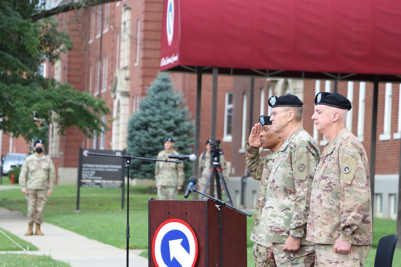 Maj. Gen. Michel M. Russell Sr., commanding general, 1st Theater Sustainment Command, releases authority of the unit to Col. Joseph Kurz, chief of staff, 1st TSC, after the change of command ceremony held July 13, 2021 outside of Fowler Hall in Fort Knox, Kentucky. Maj. Gen. Michel M. Russell Sr. assumed command of the 1st TSC from Maj. Gen. John P. Sullivan before an audience of current and former leaders, community members, family, and 1st TSC Soldiers. (U.S. Army Photo by Spc. Zoran Raduka, 1st TSC Public Affairs)