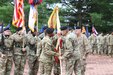 Maj. Gen. Michel M. Russell Sr., commanding general, 1st Theater Sustainment Command, releases authority of the unit to Col. Joseph Kurz, chief of staff, 1st TSC, after the change of command ceremony held July 13, 2021 outside of Fowler Hall in Fort Knox, Kentucky. Maj. Gen. Michel M. Russell Sr. assumed command of the 1st TSC from Maj. Gen. John P. Sullivan before an audience of current and former leaders, community members, family, and 1st TSC Soldiers. (U.S. Army Photo by Spc. Zoran Raduka, 1st TSC Public Affairs)