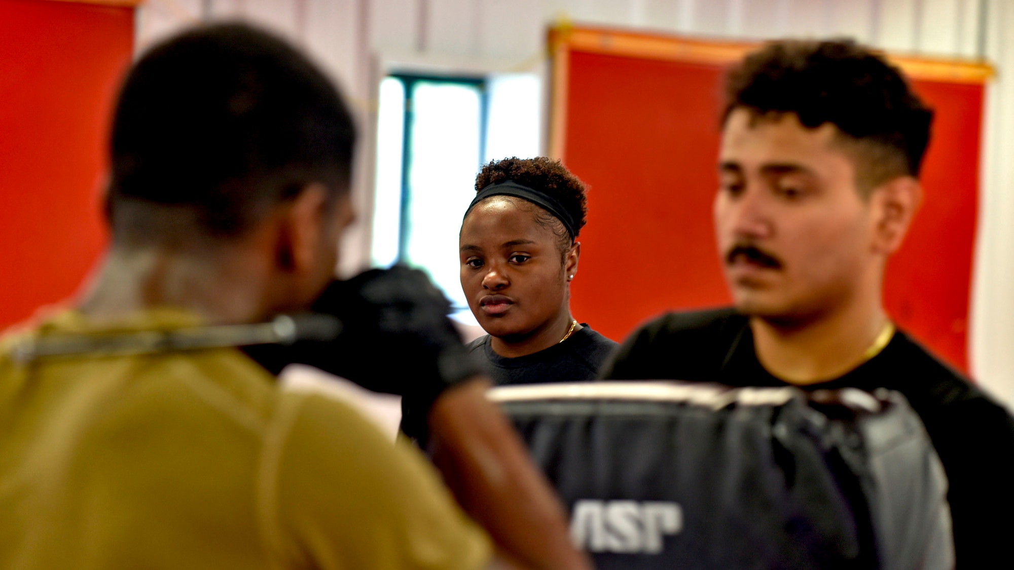 U.S. Air Force SrA Jamonica Smith, 87th Security Forces Squadron Raven Instructor, observes during baton drills during Raven Pre-requisite training at Joint Base McGuire-Dix-Lakehurst on July 13, 2021.