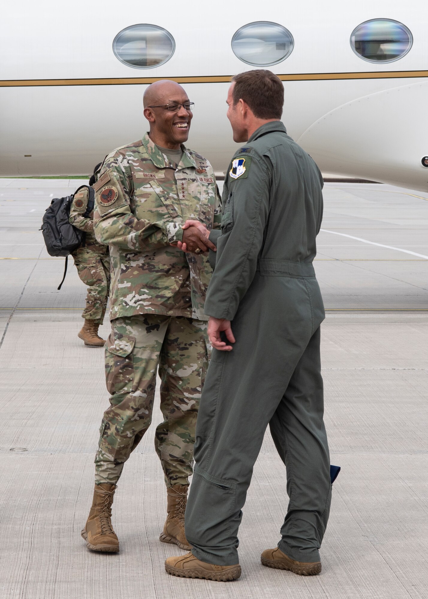 U.S. Air Force Col. Leslie Hauck, 52nd Fighter Wing commander (right) greets U.S. Air Force Chief of Staff Gen. CQ Brown Jr. during a visit July 16, 2021, on Spangdahlem Air Base, Germany.