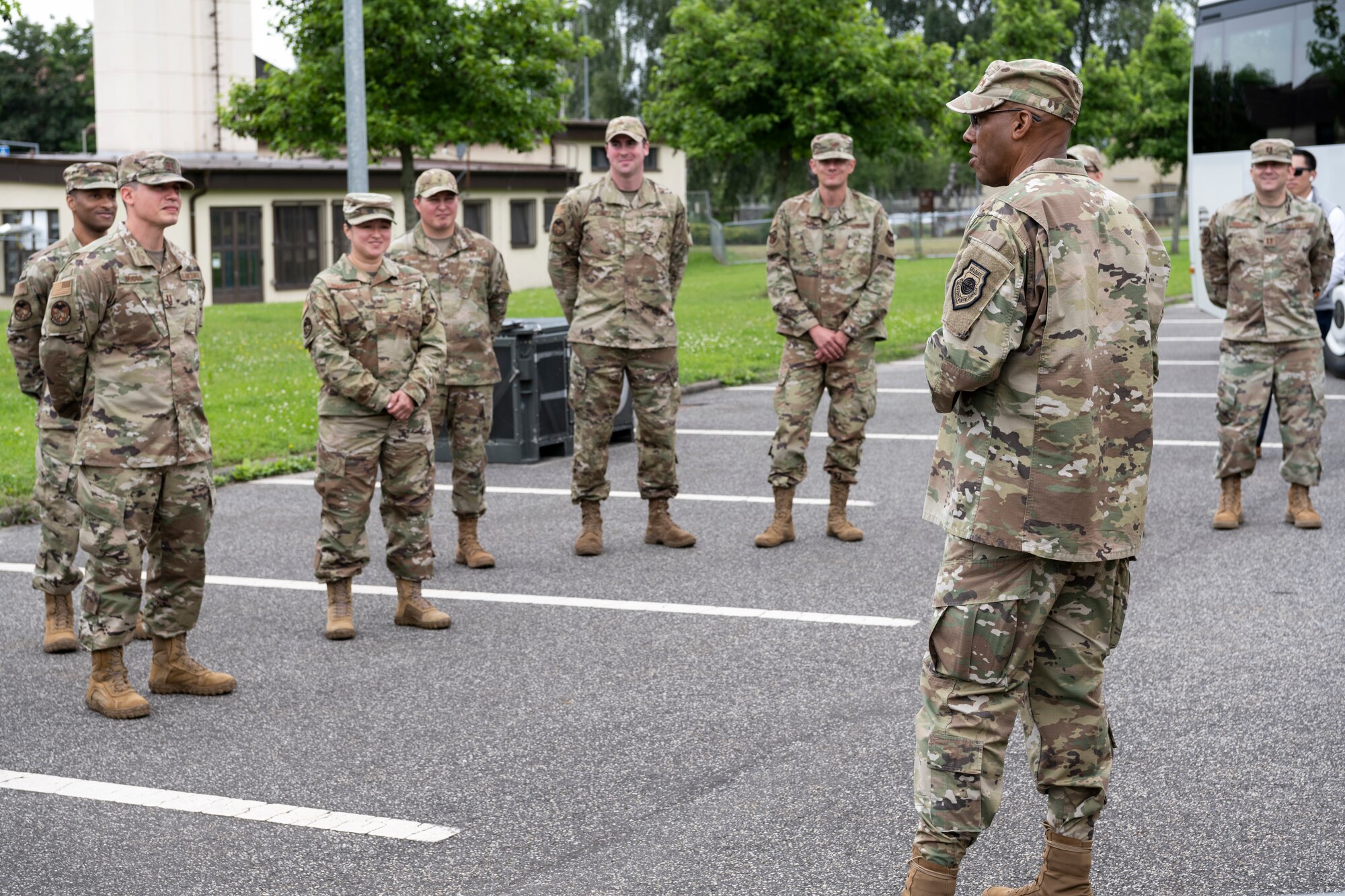 U.S. Air Force Chief of Staff Gen. CQ Brown Jr. speaks with Airmen at the 52nd Fighter Wing Restriction of Movement (ROM) village July 16, 2021, on Spangdahlem Air Base, Germany.