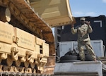 Virginia National Guard Soldiers load a bulldozer onto a trailer for transport July 9, 2021, at Fort Pickett, Virginia. The bulldozer is part of the heavy equipment the 180th Engineer Company, 276th Engineer Battalion, 329th Regional Support Group, is using during a training rotation July 10-Aug. 3, 2021, at the Joint Readiness Training Center in Fort Polk, Louisiana.