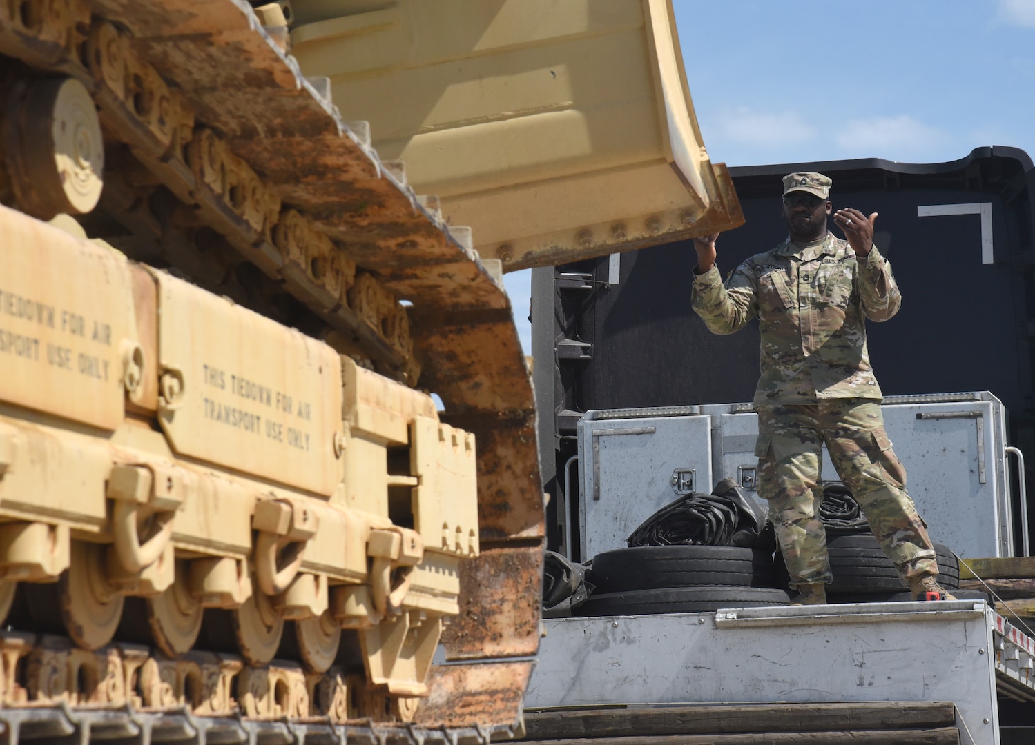 Virginia National Guard Soldiers load a bulldozer onto a trailer for transport July 9, 2021, at Fort Pickett, Virginia. The bulldozer is part of the heavy equipment the 180th Engineer Company, 276th Engineer Battalion, 329th Regional Support Group, is using during a training rotation July 10-Aug. 3, 2021, at the Joint Readiness Training Center in Fort Polk, Louisiana.