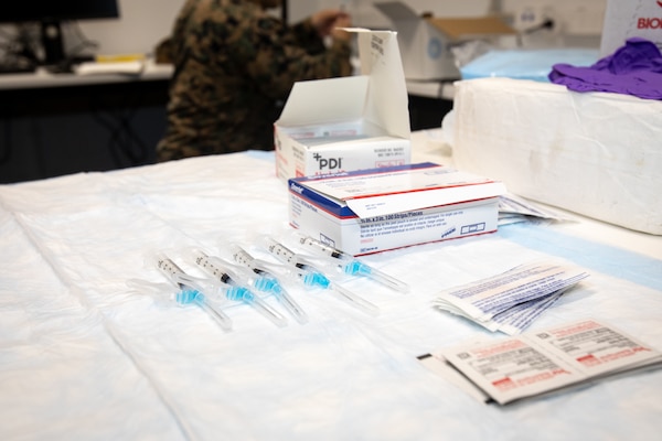 COVID-19 vaccines are staged to be immediately ready for patients at Larrakeyah Barracks, Darwin, NT, Australia.