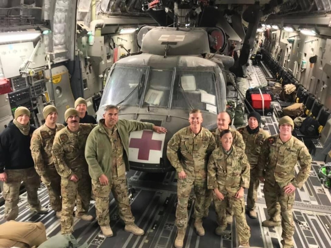 Members of Det. 1, Charlie Company, 2nd Battalion, 238th Aviation Regiment MEDEVAC leave Afghanistan on an Air Force C17 after their overseas deployment on Oct. 14, 2020