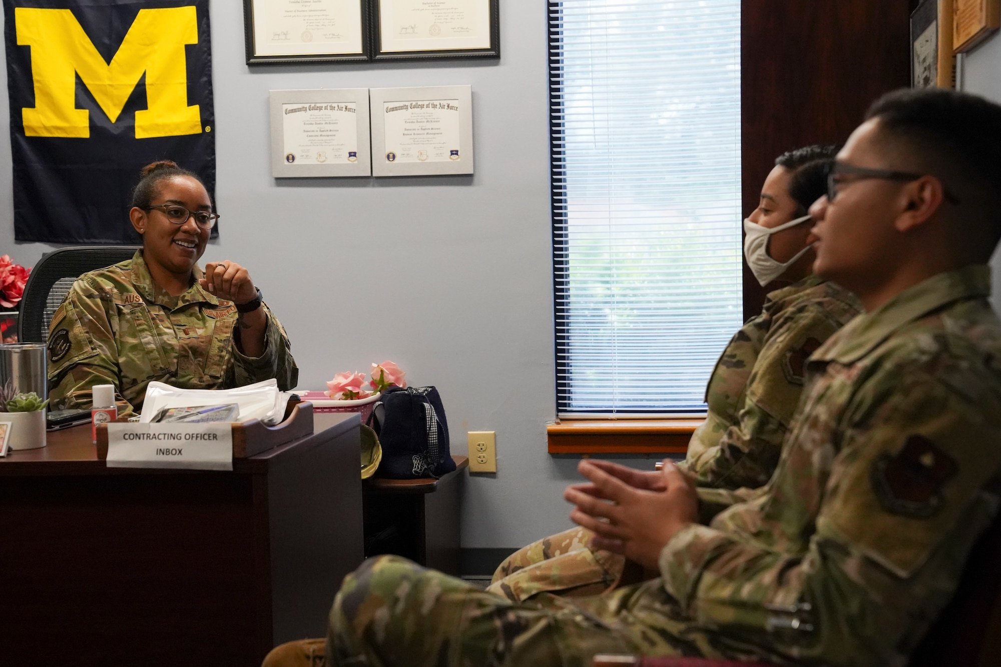 U.S. Air Force Lt. Tenisha Austin, 81st Contracting Squadron infrustructure flight commander, hosts a meeting inside the contracting building at Keesler Air Force Base, Missisippi, July 14, 2021. The 81st CONS is responsible for providing contracting support to the 81st Training Wing, tenant units and other Defense Department missions across the globe. (U.S. Air Force photo by Senior Airman Spencer Tobler)