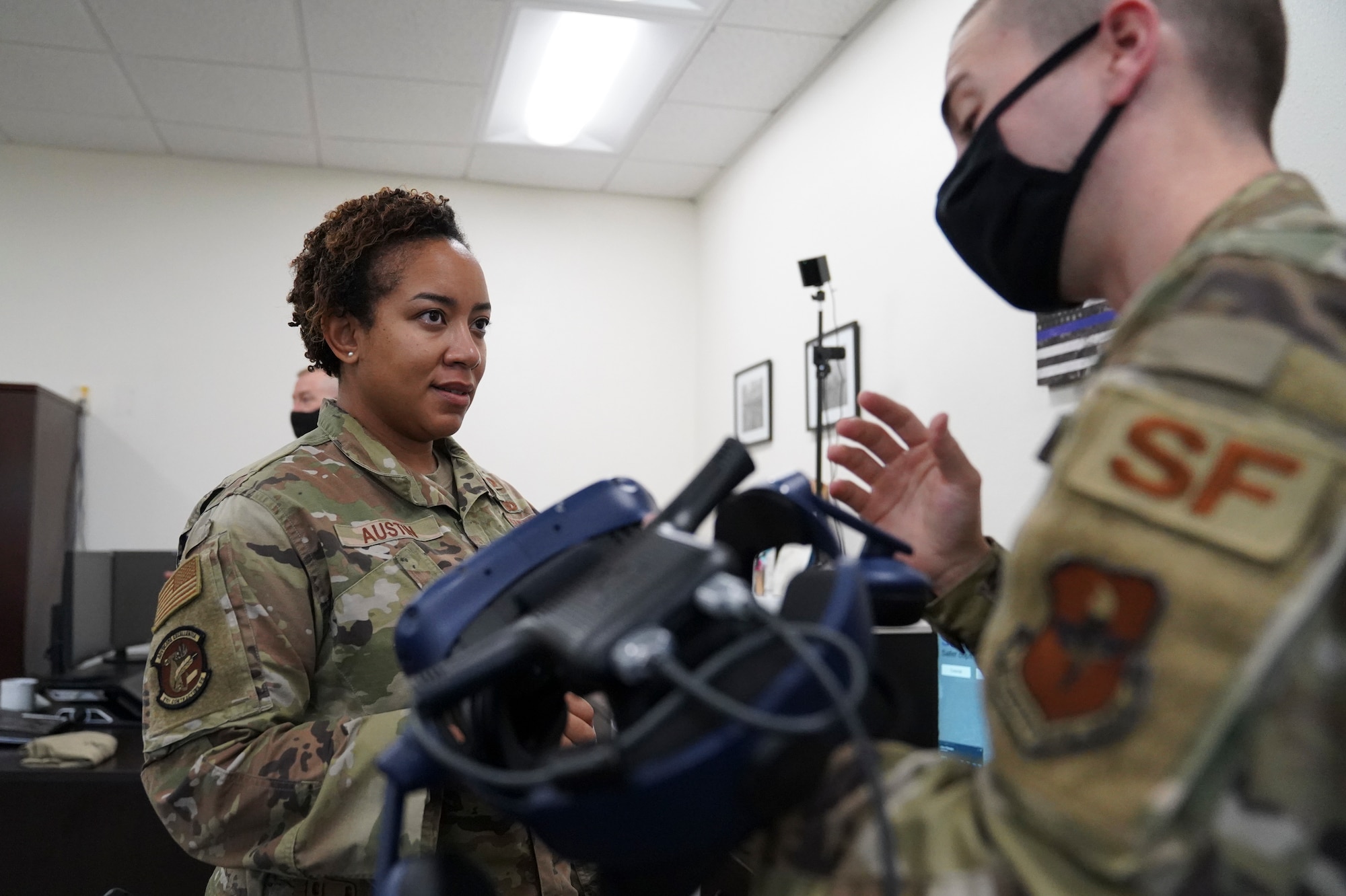 U.S. Air Force Lt. Tenisha Austin, 81st Contracting Squadron infrustructure flight commander, prepares to use a virtual-reality system inside the security forces building at Keesler Air Force Base, Missisippi, July 15, 2021. The 81st CONS is responsible for providing contracting support to the 81st Training Wing, tenant units and other Defense Department missions across the globe. (U.S. Air Force photo by Senior Airman Spencer Tobler)