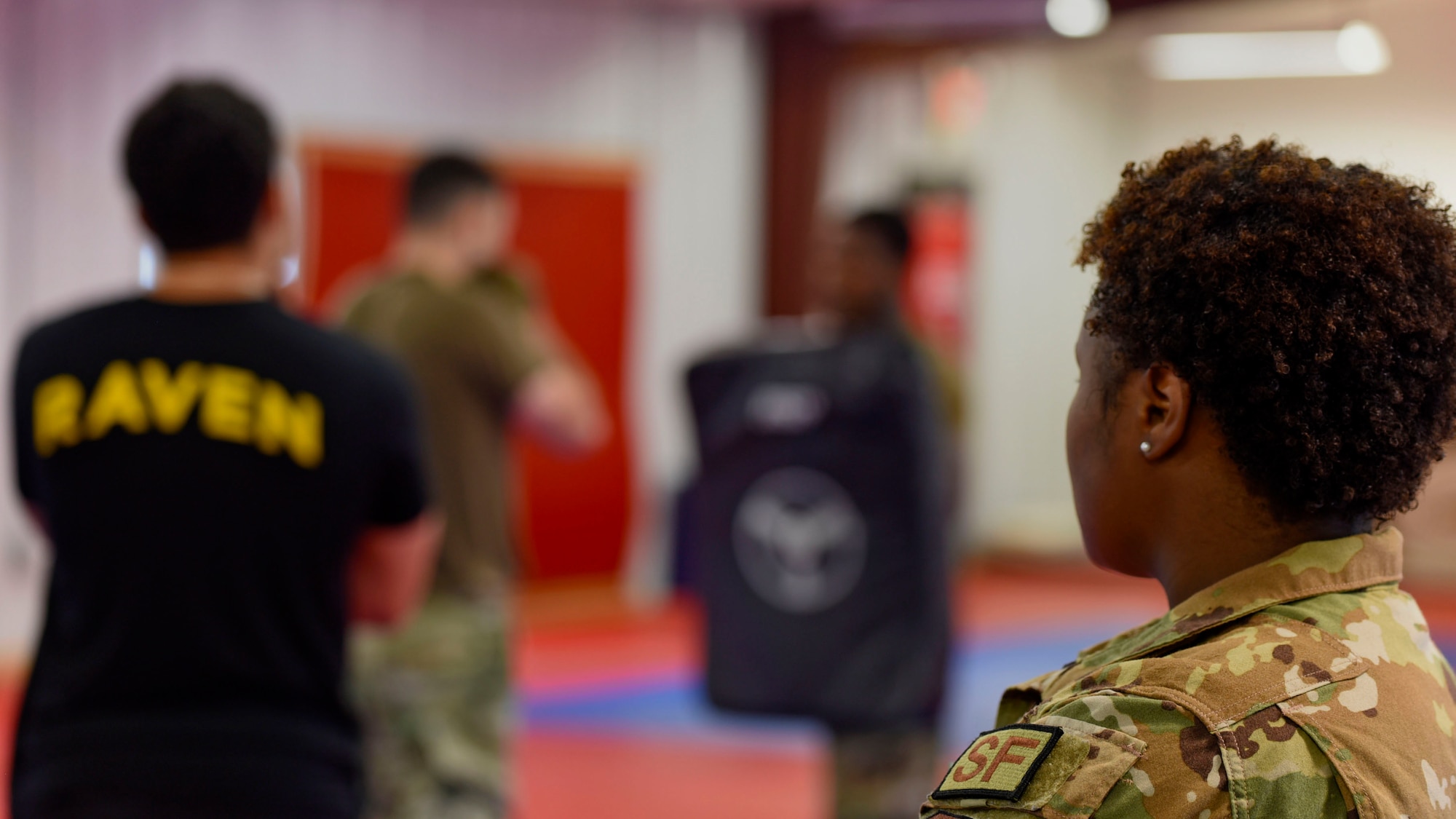 U.S. Air Force SrA Jamonica Smith, 87th Security Forces Squadron Raven Instructor, observes during baton drills during Raven Pre-requisite training at Joint Base McGuire-Dix-Lakehurst on July 13, 2021.
