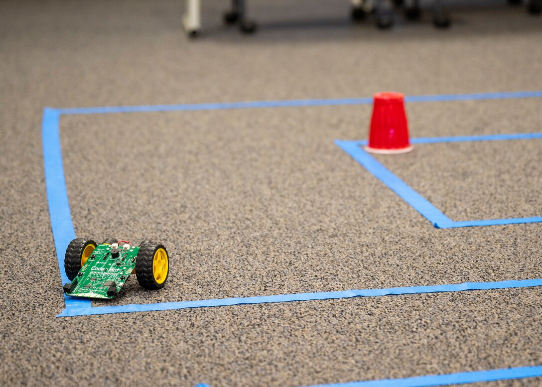 A small robot maneuvers through a maze during a Code Bot Course that was offered at Edwards Air Force Base, May 13. Project Code Bot graduated 10 remote students in May 2021 and is slated to conduct the next class August 16-20.
