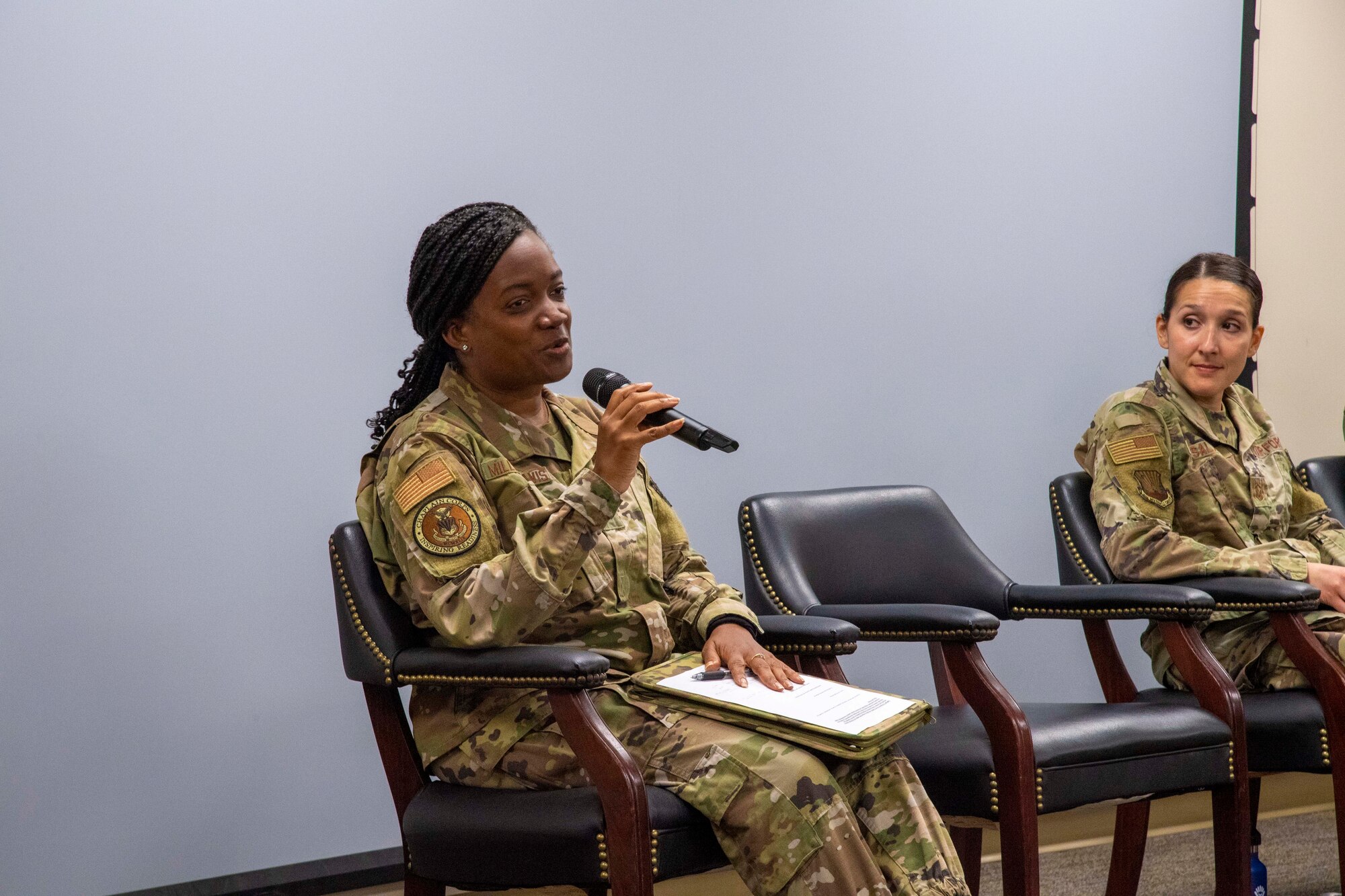 U.S. Air Force Lt. Col. Miller Davis, 6th Air Refueling Wing chaplain, and U.S. Air Force Master Sgt. Raquel Salas, 6th Operational Medical Readiness Squadron Mental Health Clinic flight chief, speak during a mental health discussion panel at MacDill Air Force Base, Florida, July 13, 2021.