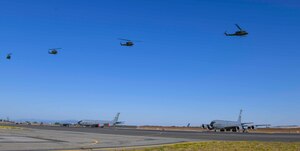Airmen from the 36th Rescue Squadron fly four UH-1N Hueys in formation over KC-135 Stratotankers on Fairchild Air Force, Washington, July 16, 2021. The UH-1N’s were flown in the order the 36th RQS received them. Leading the formation was tail 6648, a 50-year-old helicopter with nearly 20,000 service hours. (U.S. Air Force photo by Airman 1st Class Kiaundra Miller)