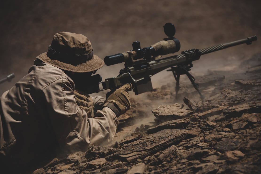 210610-M-JU875-1002 TABUK, Saudi Arabia (June 10, 2021) - A Royal Saudi Land Forces soldier fires a rifle as part of long-range live-fire training with U.S. Marines assigned to the 24th Marine Expeditionary Unit (MEU) during a theater amphibious combat rehearsal (TACR) in Tabuk, Kingdom of Saudi Arabia, June 10. TACR integrates U.S. Navy and Marine Corps assets to exercise a range of critical combat-related capabilities, both afloat and ashore. 24th MEU is deployed to the U.S. 5th Fleet area of operations in support of naval operations to ensure maritime stability and security in the Central Region, connecting the Mediterranean and Pacific through the western Indian Ocean and three strategic choke points. (U.S. Marine Corps photo by Cpl. Davis Harris)