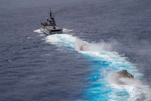 PHILIPPINE SEA (June 13, 2021) Japan Maritime Self Defense Force tank landing ship JDS Shimokita (LST 4002) prepares to recover two landing craft, air cushion after bilateral operations with the America Amphibious Ready Group (ARG) and 31st Marine Expeditionary Unit (MEU). The America ARG, along with the 31st MEU, is operating in the U.S. 7th Fleet area of operations to enhance interoperability with allies and partners and serve as a ready response force to defend peace and stability in the Indo-Pacific region.