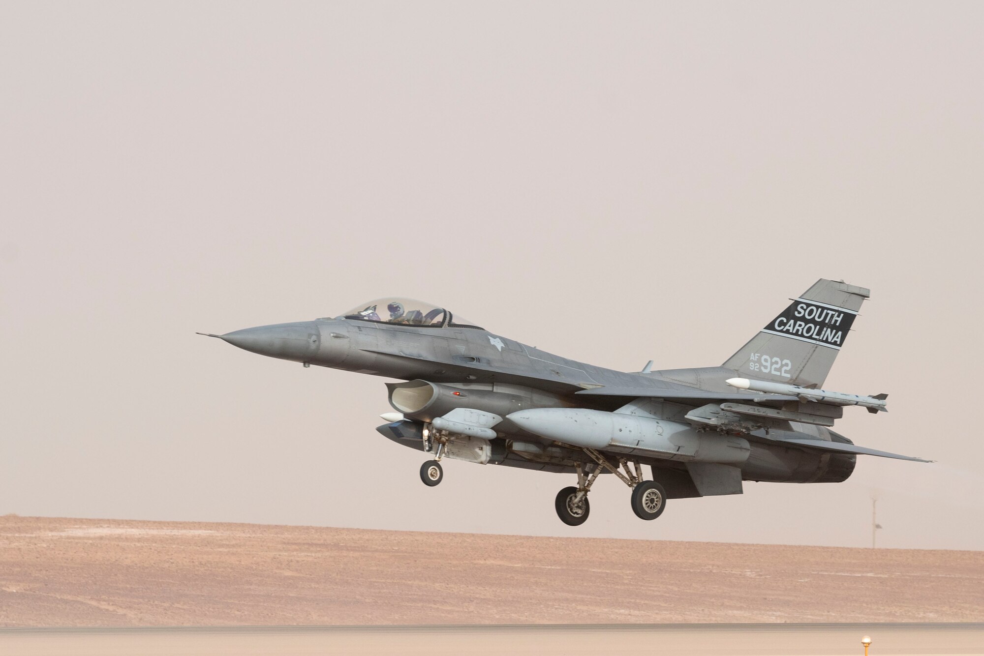 A U.S. Air Force F-16 Fighting Falcon takes off during a partner nation integration mission with the Royal Saudi Air Force at Prince Sultan Air base, June 17, 2021. U.S. Air Forces Central aircraft regularly work with coalition and partner nations to test their collective counter-UAS capabilities to ensure the security and stability of regional airspace. (U.S. Air Force photo by Staff Sgt. Caleb Pavao)