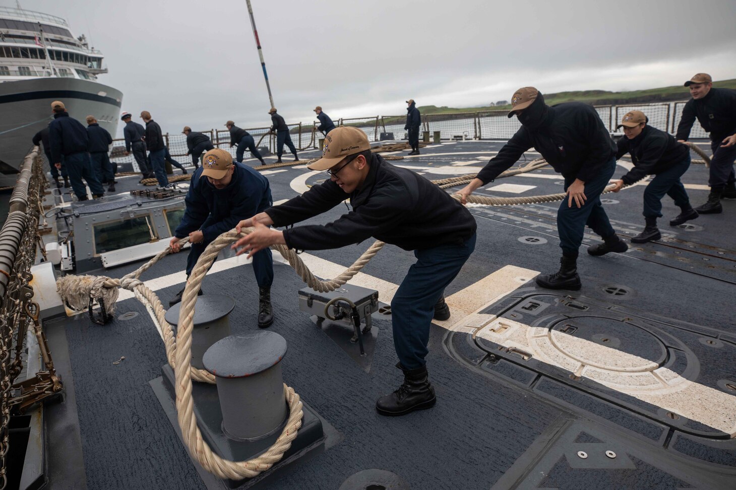 (July 18, 2021) Sailors aboard the Arleigh Burke-class guided-missile destroyer USS Roosevelt (DDG 80) handle line during a sea and anchor evolution, July 18, 2021. Roosevelt, forward-deployed to Rota, Spain, is on its second patrol in the U.S. Sixth Fleet area of operations in support of regional allies and partners and U.S. national security interests in Europe and Africa.