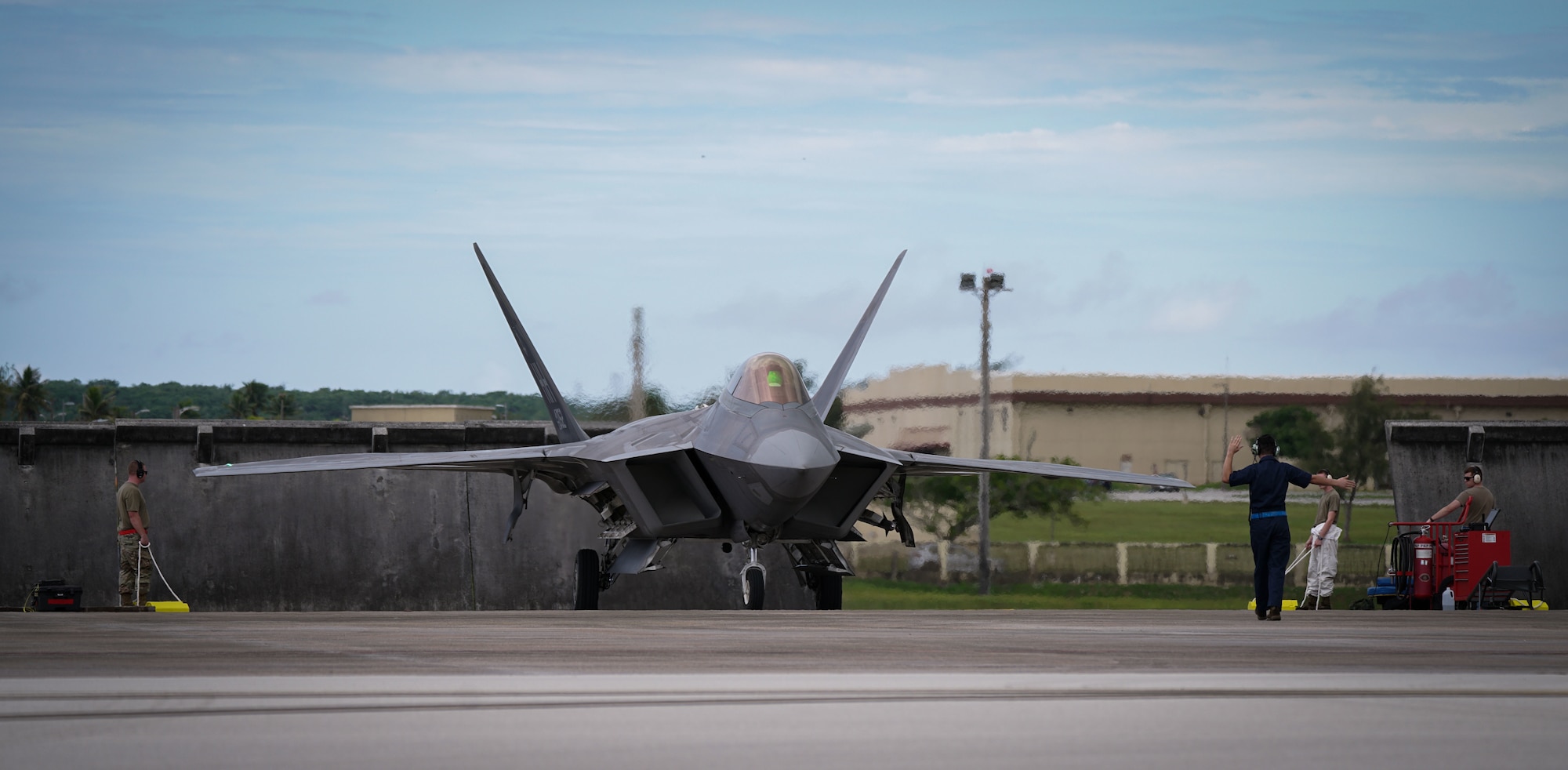 A U.S. Air Force F-22 Raptor assigned to the 199th Fighter Squadron, 154th Wing, Joint Base Pearl Harbor Hickam, Hawaii, arrives in support of Pacific Iron 2021 at Andersen Air Force Base, Guam, July 18, 2021. Pacific Iron 2021 is a Pacific Air Forces dynamic force employment operation to project forces into the USINDOPACOM’s area of responsibility in support of the 2018 National Defense Strategy which called on the military to be a more lethal, adaptive, and resilient force. (U.S. Air Force photo by Master Sgt. Richard P. Ebensberger)